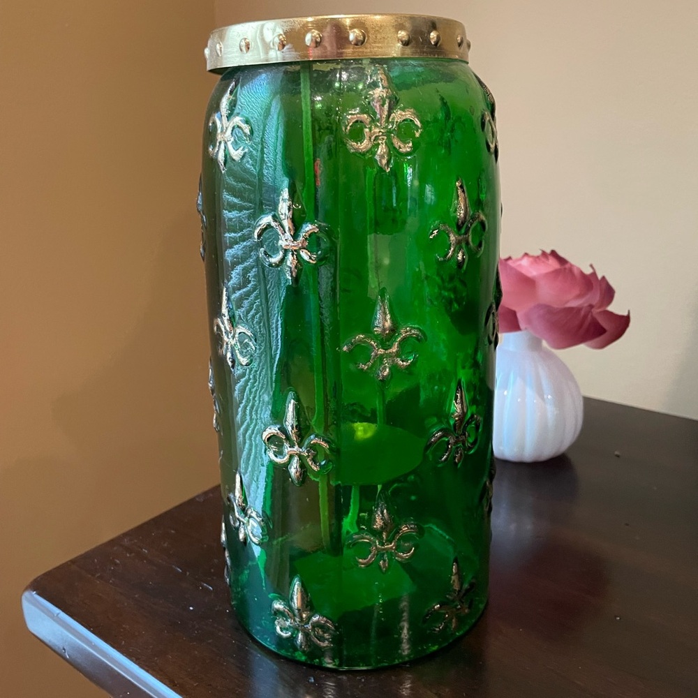 Green glass container with gold fleur de lis accent with candle holder insert
